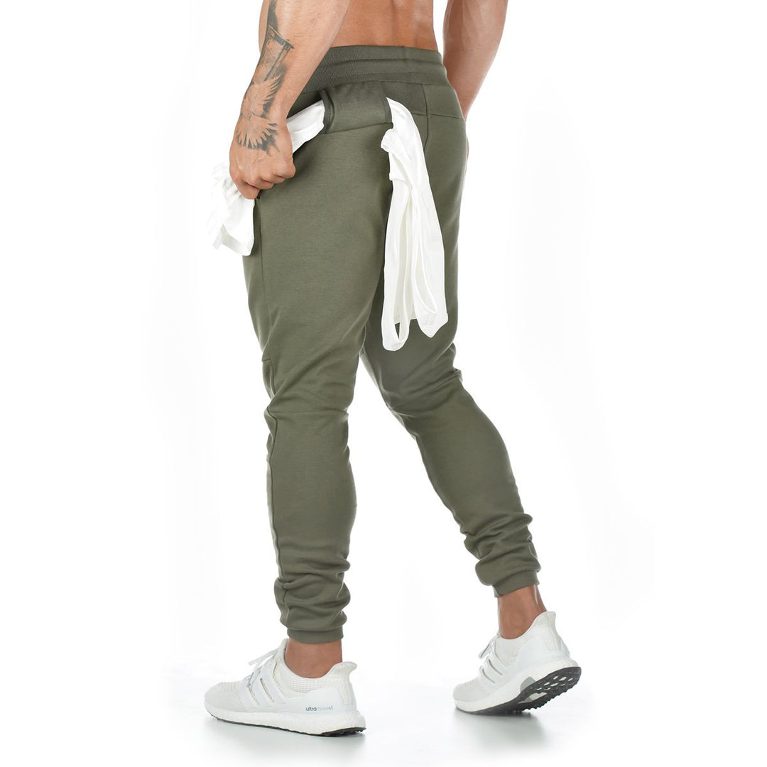 Men's narrow-cut joggers with ribbed waistband, zip pocket, and knee darts StylebySassy