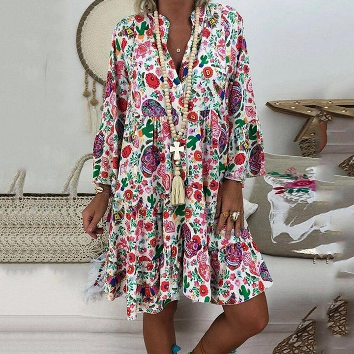 Women's A-line tunic mini dress with V-neck, tiered ruffles, and Boho bandana print StylebySassy