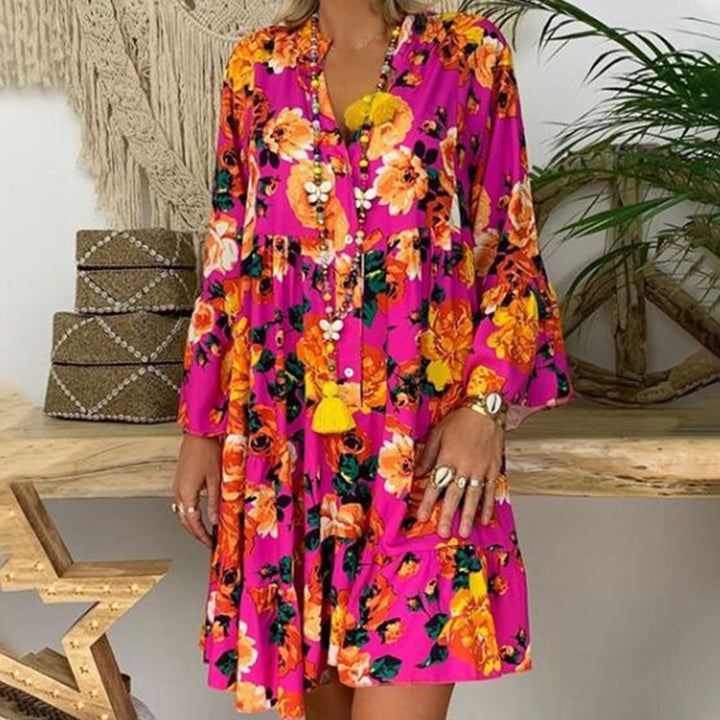 Women's A-line tunic mini dress with V-neck, tiered ruffles, and Boho bandana print StylebySassy