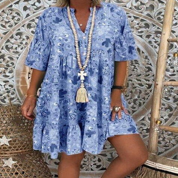 Women's A-line tunic mini dress with V-neck, tiered ruffles, and Boho bandana print StylebySassy