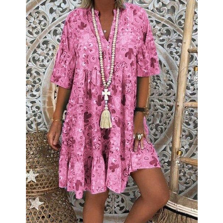 Women's A-line tunic mini dress with V-neck, tiered ruffles, and Boho bandana print StylebySassy