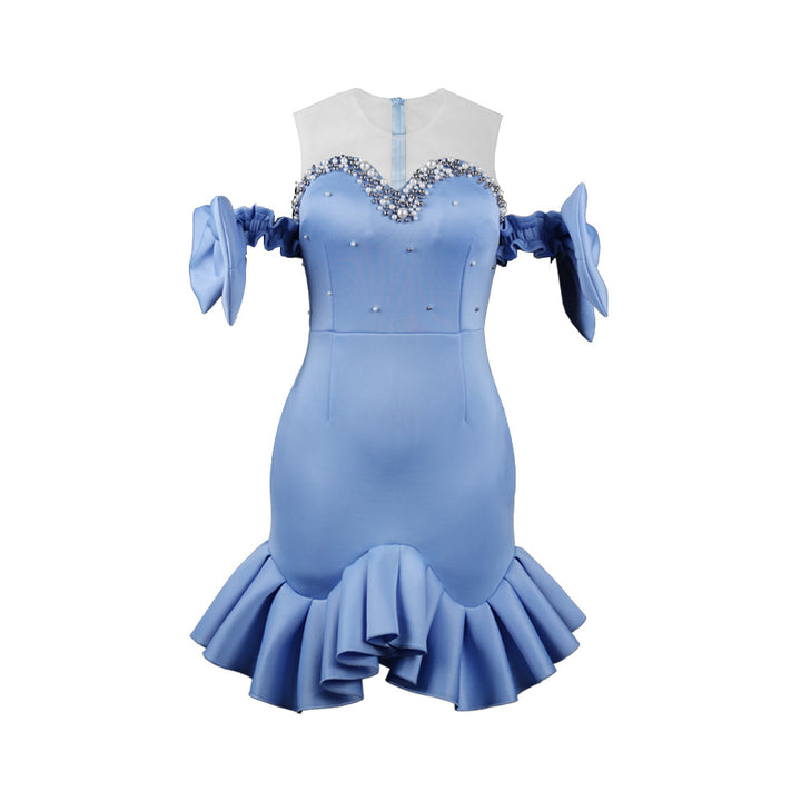 Ladies glamorous cocktail dress with transparent puff sleeves and ruffled hem