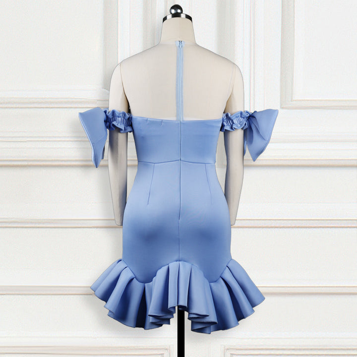 Ladies glamorous cocktail dress with transparent puff sleeves and ruffled hem