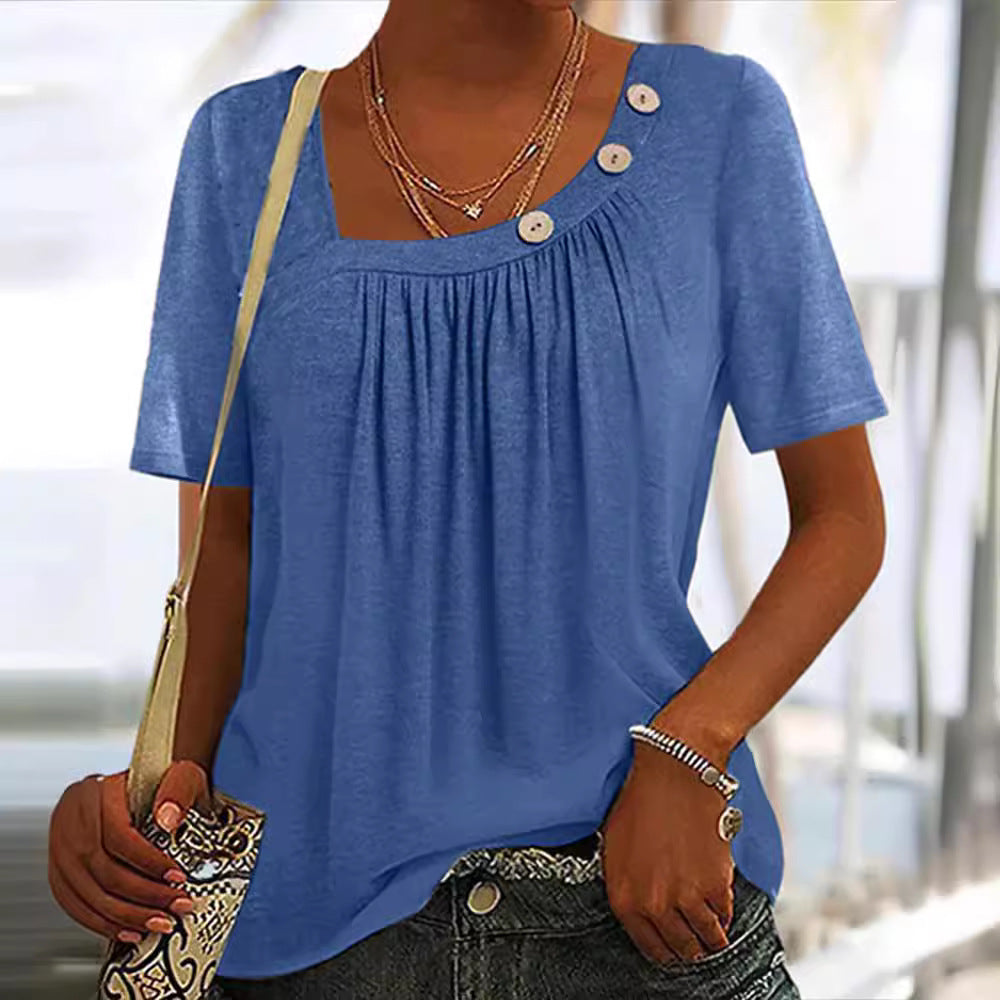 Ladies' lightweight short-sleeve tunic with square neckline, fine gathering, and asymmetric decorative buttons StylebySassy