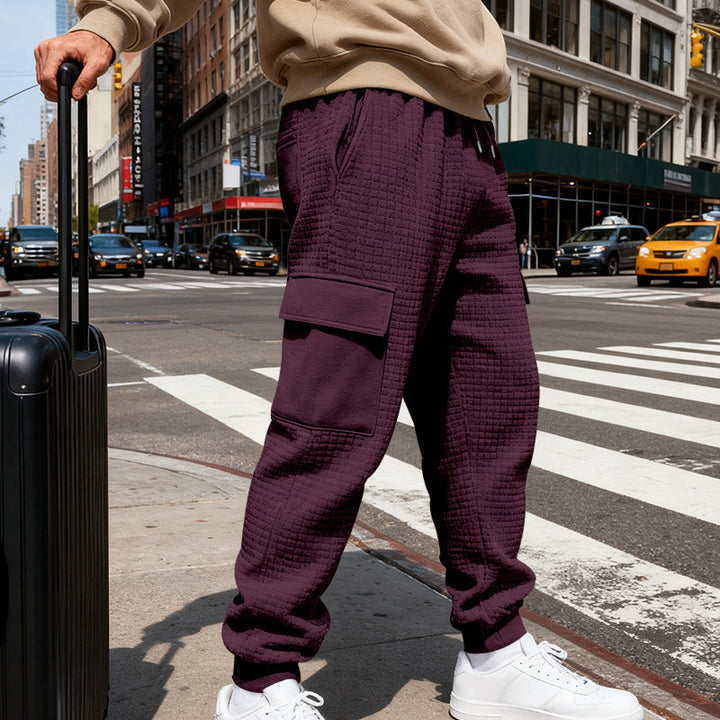 Men's waffle texture cargo pants in jogging style with flap pockets and elastic waistband StylebySassy
