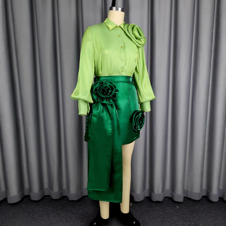 Women’s satin skirt with floral ruffle design and fitted bow detail.