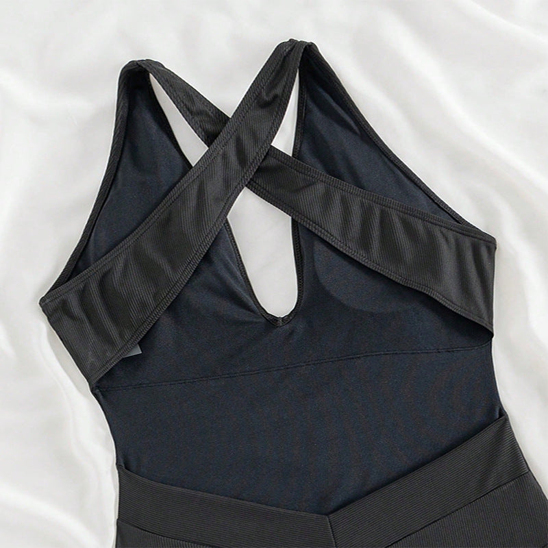 Women's one-piece swimsuit with deep V-neckline and intricate ribbed details StylebySassy