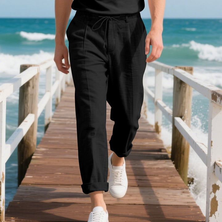 Men's beach-suitable linen blend lounge pants with elastic drawstring, subtle pleat, and rolled ankle hem StylebySassy