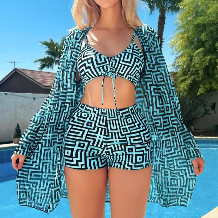 Women's stylish bikini set with geometric patterns and transparent beach jacket StylebySassy
