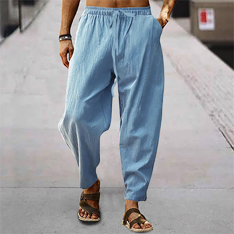 Men's relaxed summer slouch pants made of linen blend with elastic waistband and tapered ankle cuffs StylebySassy