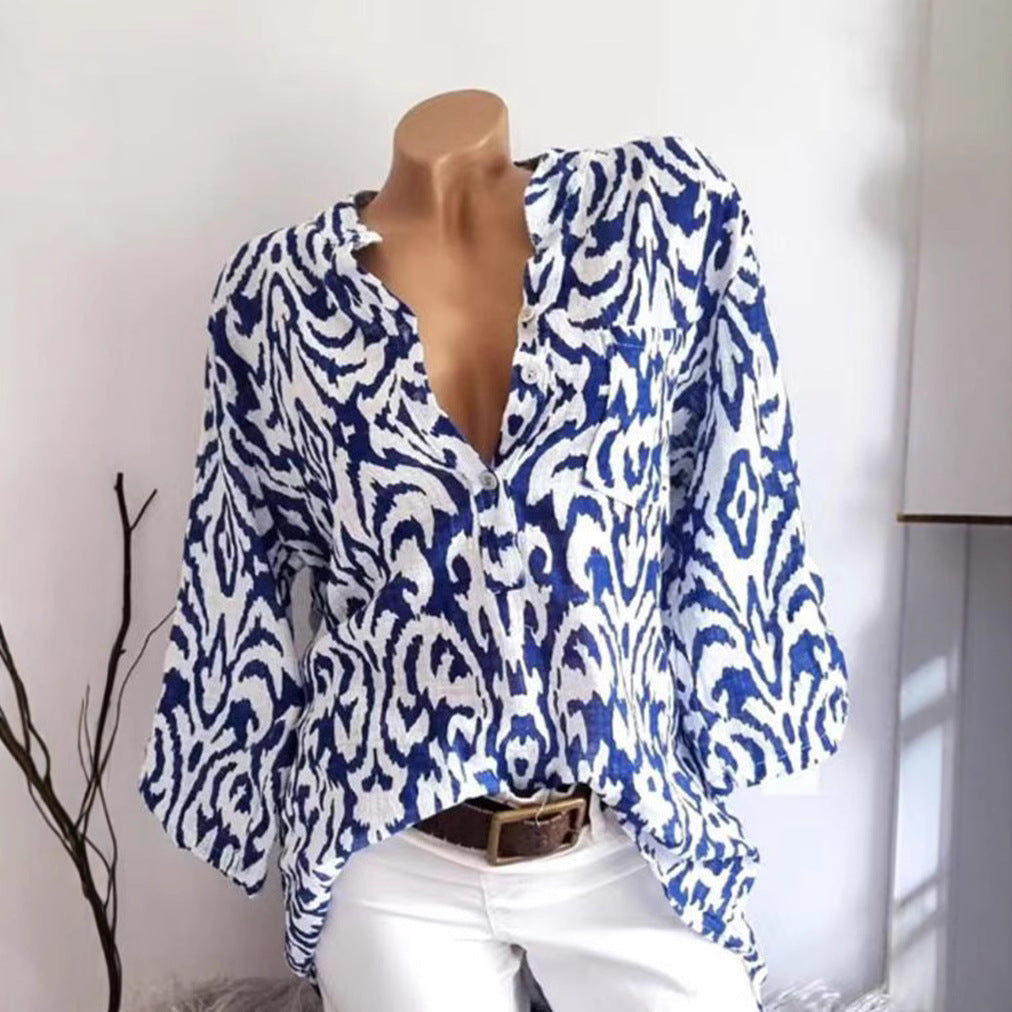 Women nan locker cut tunic blouse with Ikat pattern, V-neck and three-quarter sleeves StylebySassy