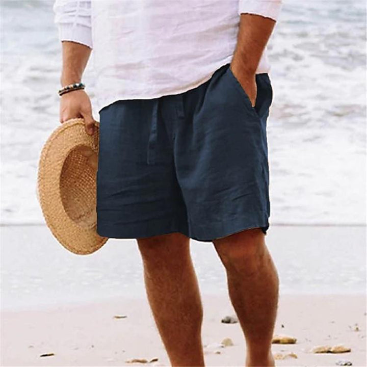 Men's casual travel Bermuda shorts with crinkle texture, adjustable drawstring, and large volume patch pockets StylebySassy