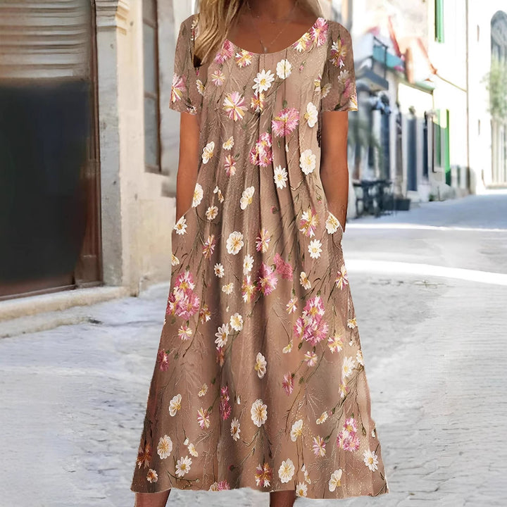 Women's nan Blumenswing midi dress with round neckline, inset pockets, and structured crepe quality StylebySassy