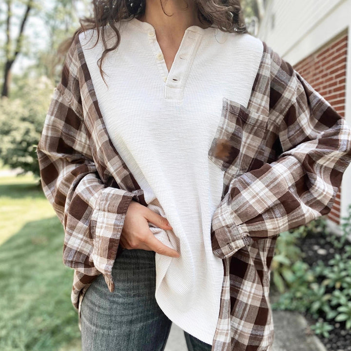 Women's checkered flannel overshirt with patch chest pocket, roll-up sleeves, and relaxed oversized fit StylebySassy