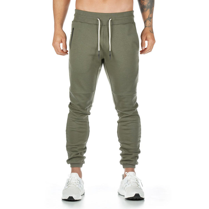 Men's narrow-cut joggers with ribbed waistband, zip pocket, and knee darts StylebySassy