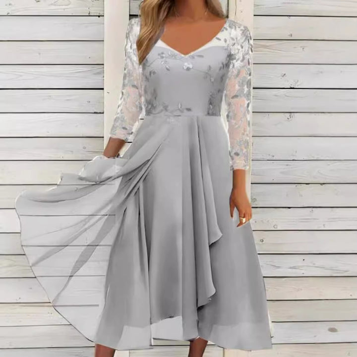 Women's V-neck chiffon midi dress with embroidered bodice, transparent three-quarter sleeves, and asymmetric layered skirt StylebySassy