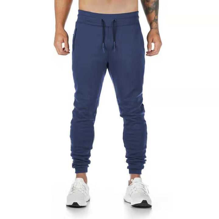 Men's narrow-cut joggers with ribbed waistband, zip pocket, and knee darts StylebySassy