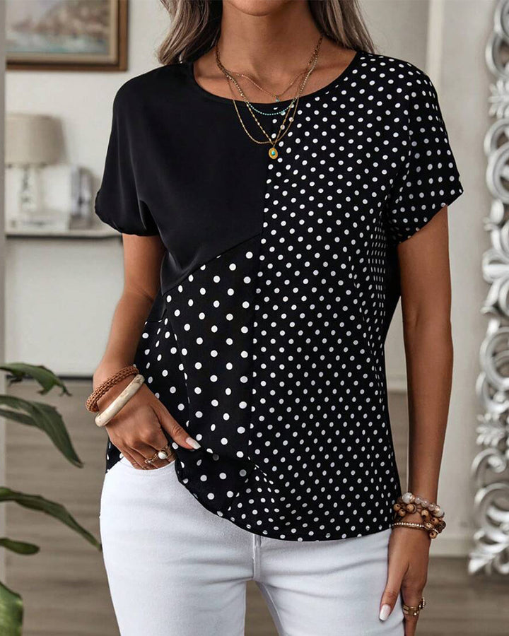 Women nan casual polka dot short sleeve top with asymmetrical seam and round neck StylebySassy