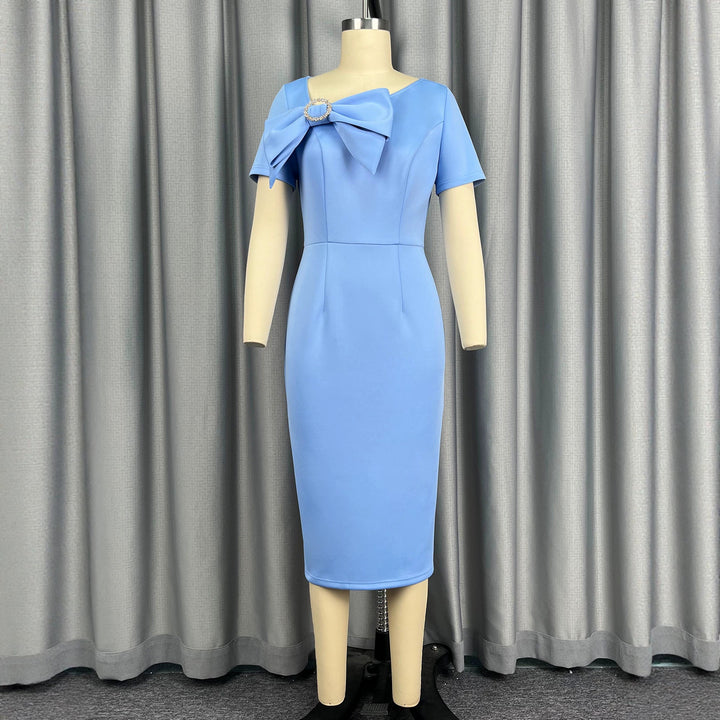 Women's fitted dress with large bow accent