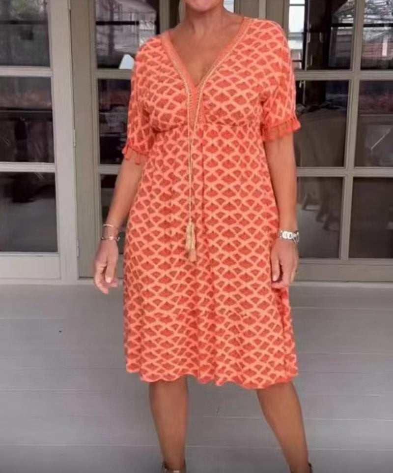 Women's casual V-neck beach dress with tassel tie and ruffle skirt StylebySassy
