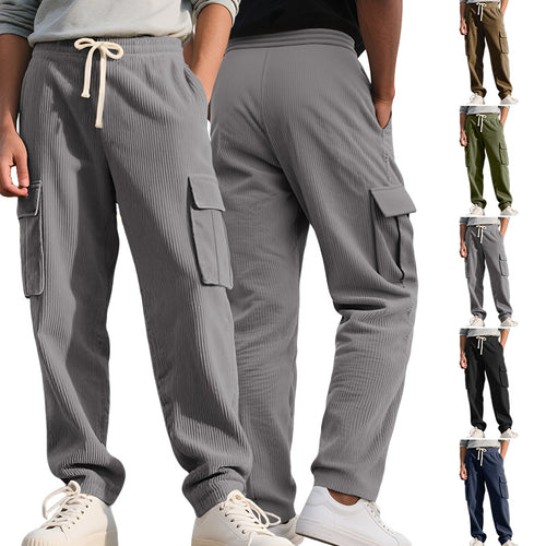 Men's casual utility cargo joggers with vertical ribbed structure, drawstring waistband, and large flap pockets StylebySassy