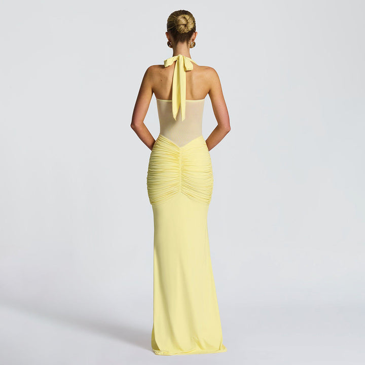 Women's figure-hugging halter evening dress with transparent mesh insert and gathered hip area StylebySassy