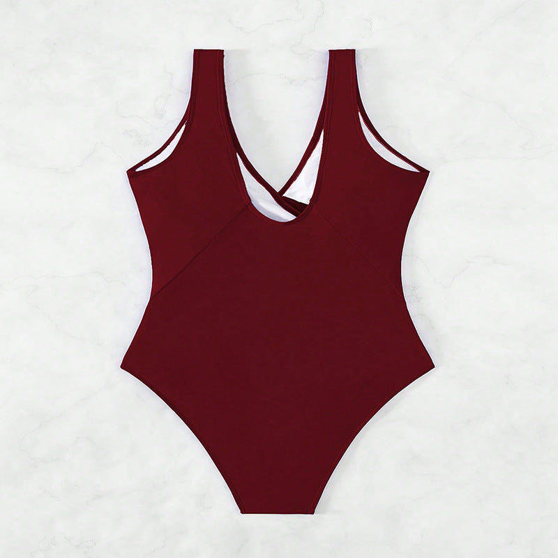 Ladies elegant one-piece swimsuit with wrap detail StylebySassy