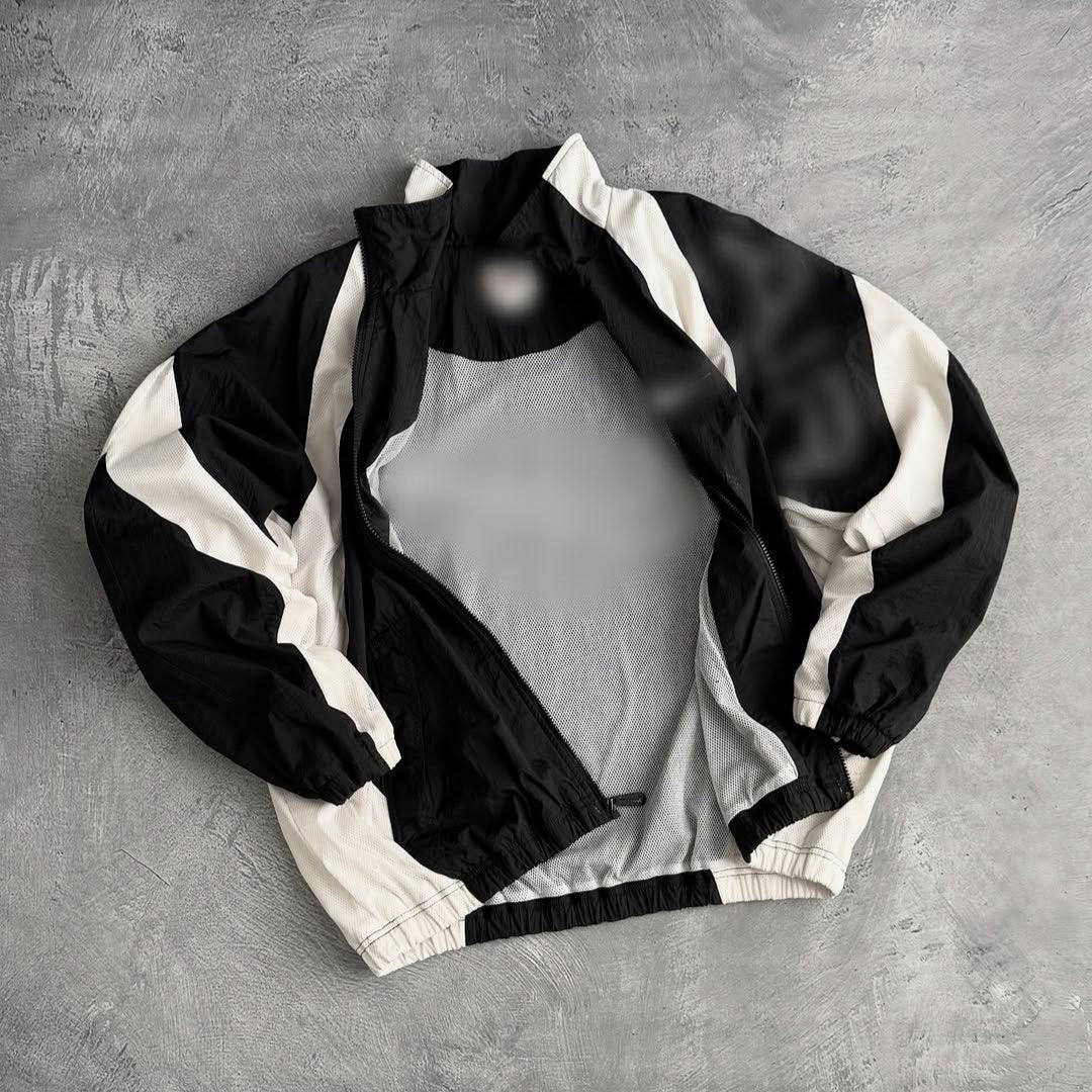 Unisex nan breathable lightweight wind and training jacket with mesh lining, stand collar and elastic hem StylebySassy