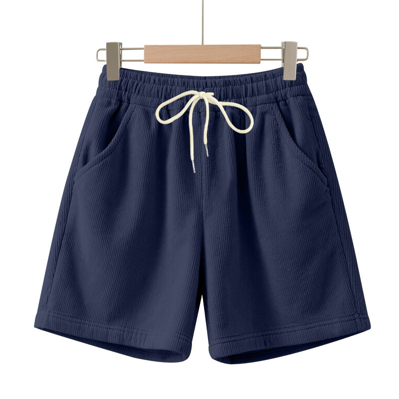 Men's ribbed jersey shorts with elastic waistband, decorative drawstring, and side slant pockets StylebySassy