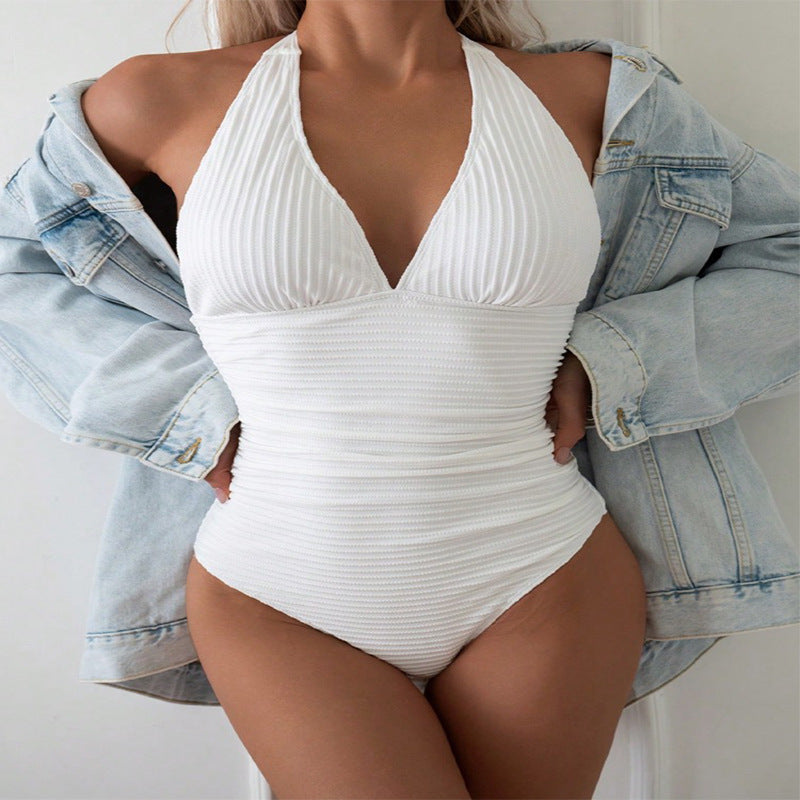 Women's one-piece swimsuit with deep V-neck and gathering