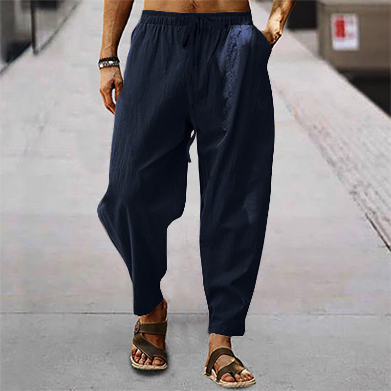 Men's relaxed summer slouch pants made of linen blend with elastic waistband and tapered ankle cuffs StylebySassy