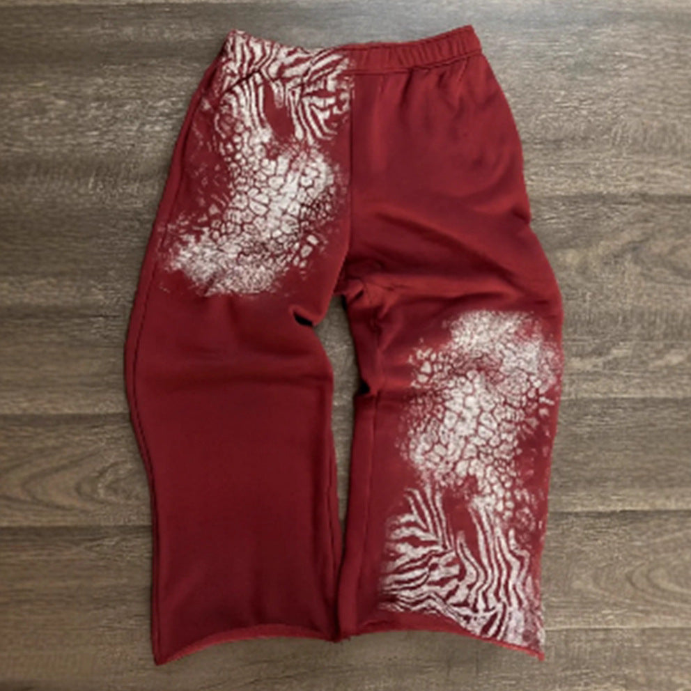 Women nan loose sweatpants with asymmetrical animal print, elastic comfort waistband and straight leg StylebySassy