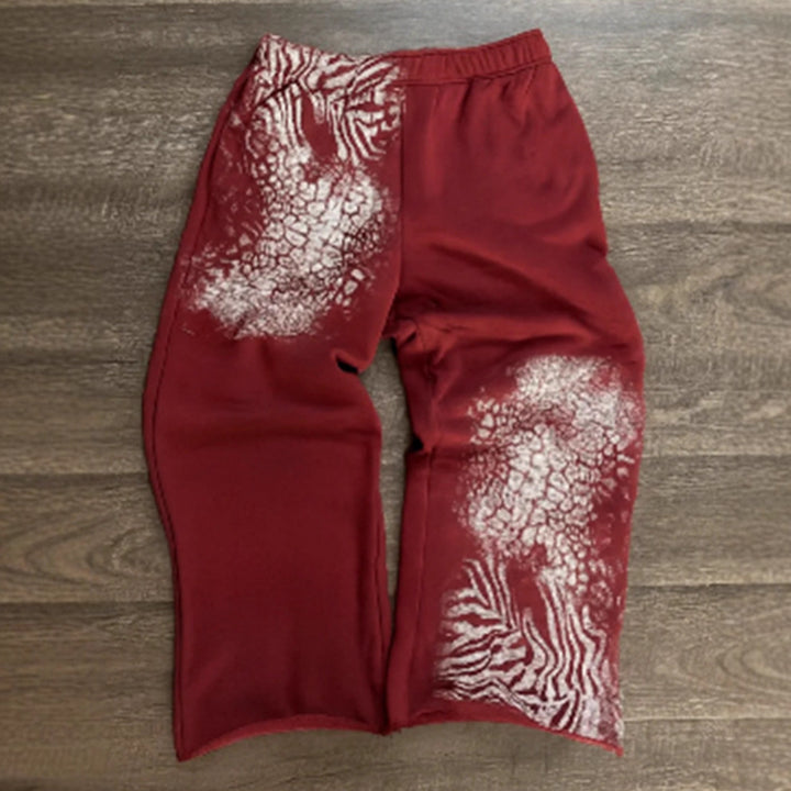Women nan loose sweatpants with asymmetrical animal print, elastic comfort waistband and straight leg StylebySassy