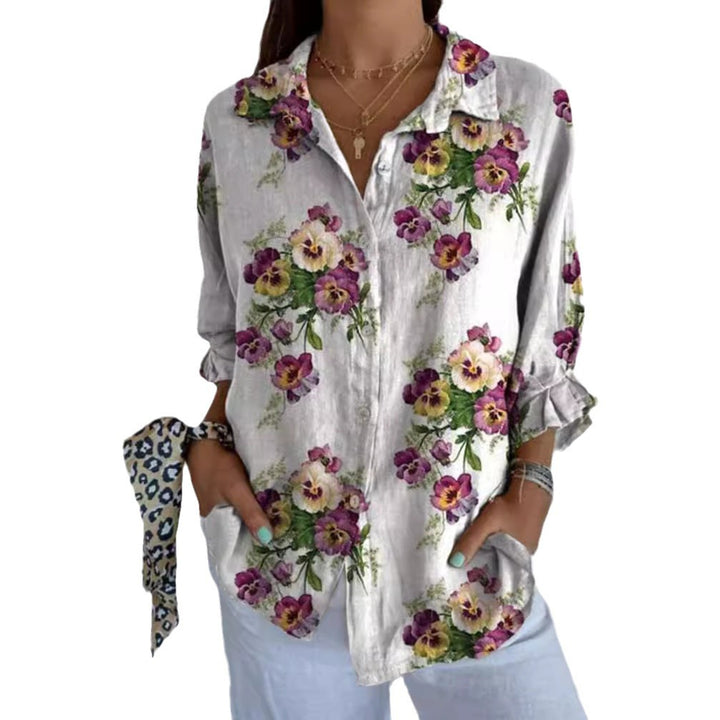 Women's lightweight linen-look shirt blouse with floral pattern, loose fit, roll-up sleeves, and patch pockets StylebySassy