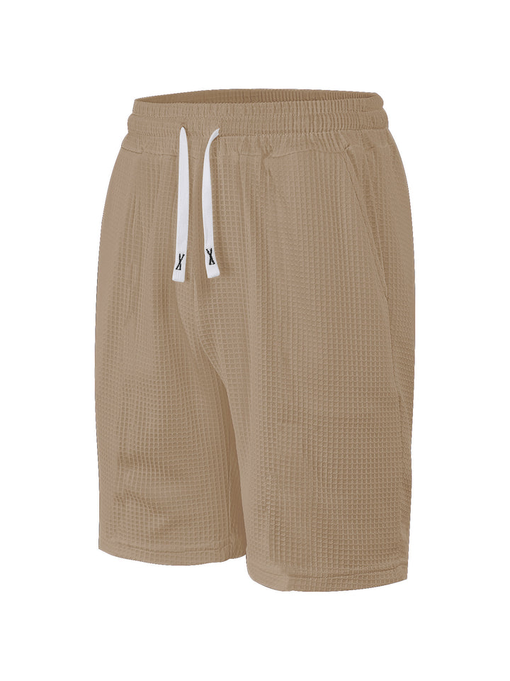 Men's breathable waffle pajama shorts with elastic comfort waistband, drawstring, and side pockets StylebySassy