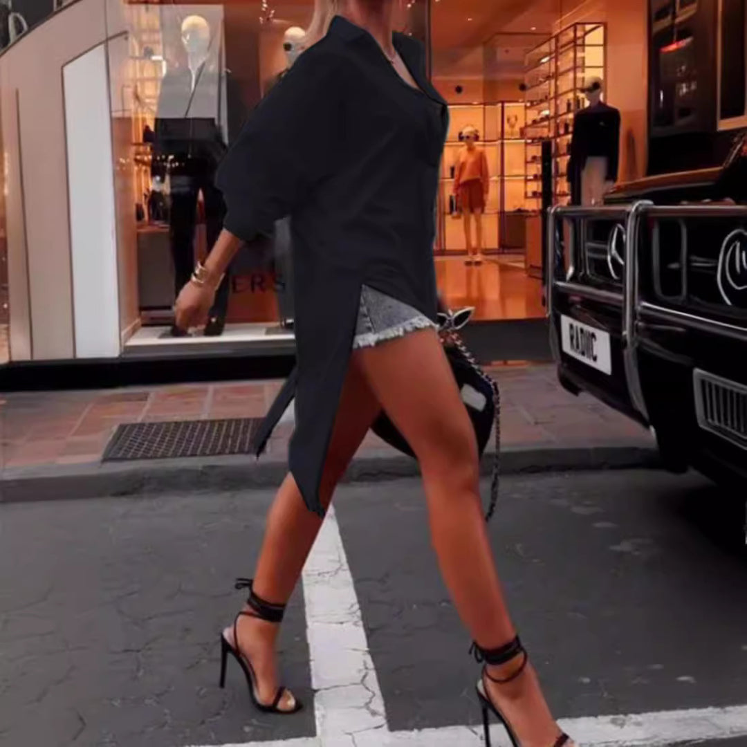 Ladies' oversized shirt dress with central back zipper, split tail hem, and elbow-length batwing sleeves StylebySassy