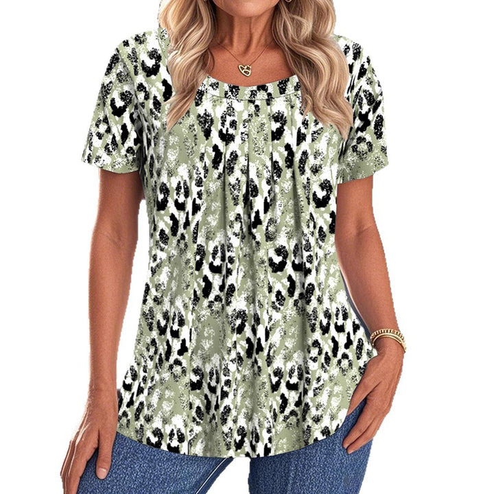 Women loose-fitting short-sleeve blouse shirt with round neckline, bust pleats, and abstract leopard pattern StylebySassy