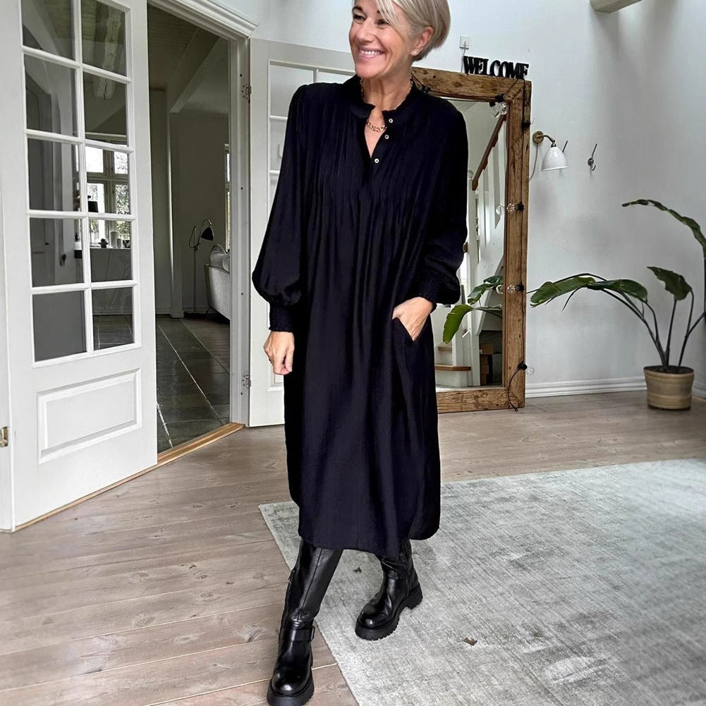 Ladies' loose midi dress with fine pleated look, stand-up collar, short button placket, smocked cuffs, and side pockets StylebySassy