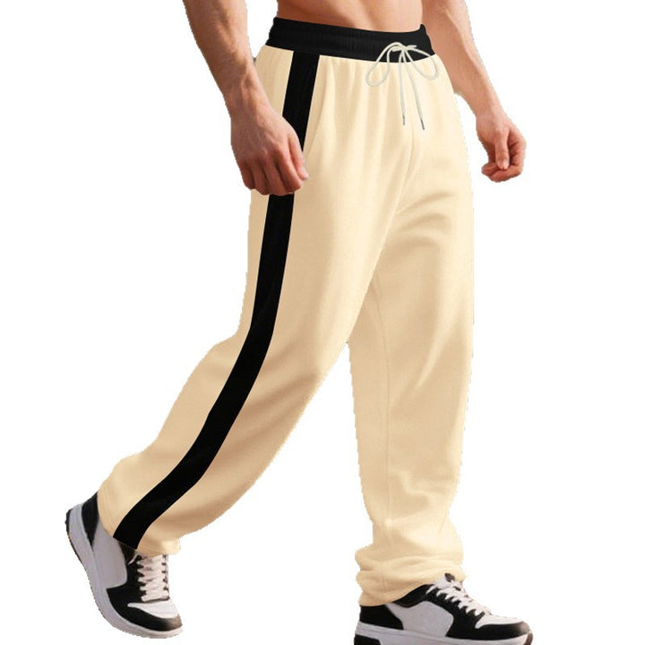 Men's wide casual track pants with contrasting side stripes, elastic drawstring waist, and open hem StylebySassy