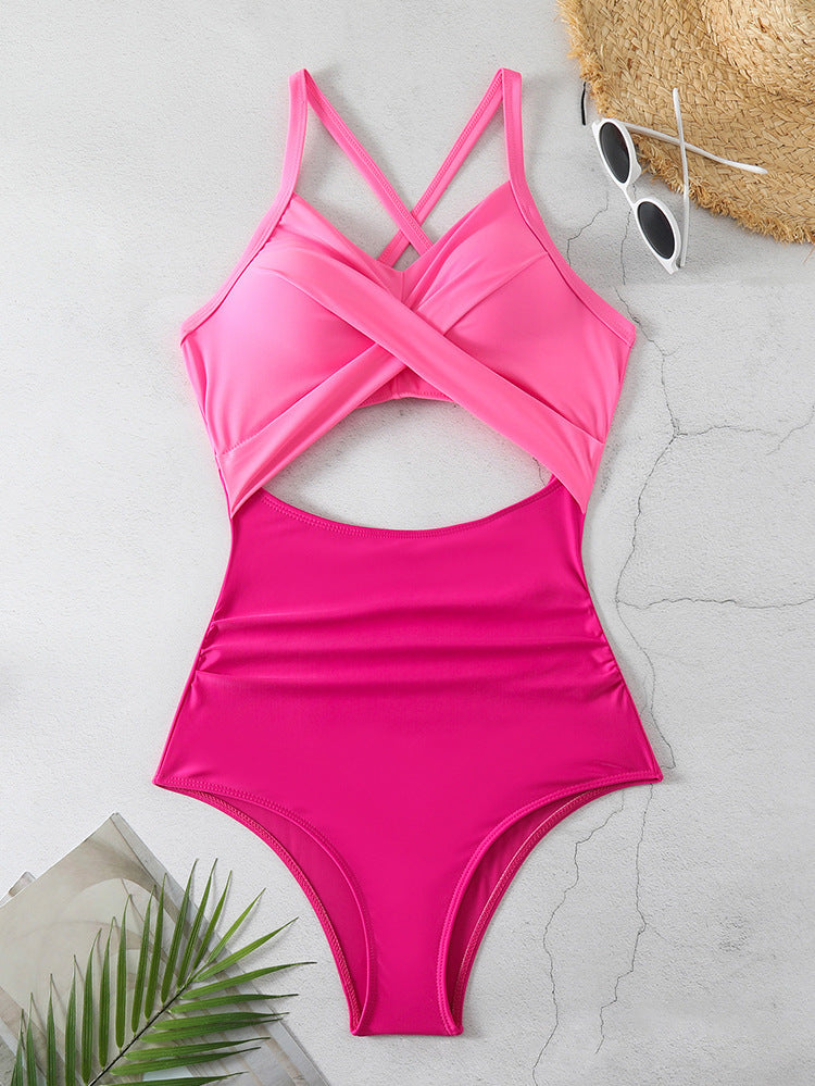 Women's one-piece swimsuit with stylish wrap design and sophisticated cross straps StylebySassy