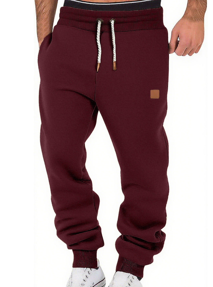 Men's comfortable jogging pants made of high-quality cotton blend with elastic waistband, drawstring, and cuffs StylebySassy