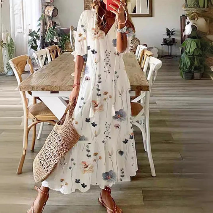 Women's ankle-length A-line summer dress with all-over floral pattern V-neck and loose fit StylebySassy