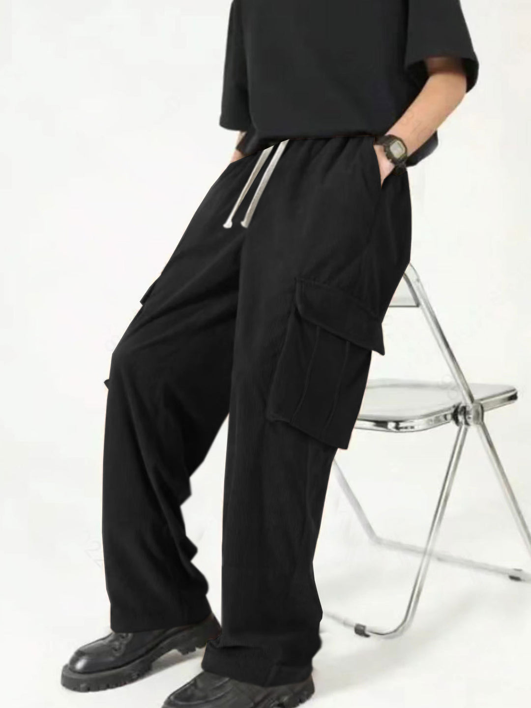 Men's loose wide corduroy cargo pants with drawstring waistband and large flap pockets StylebySassy