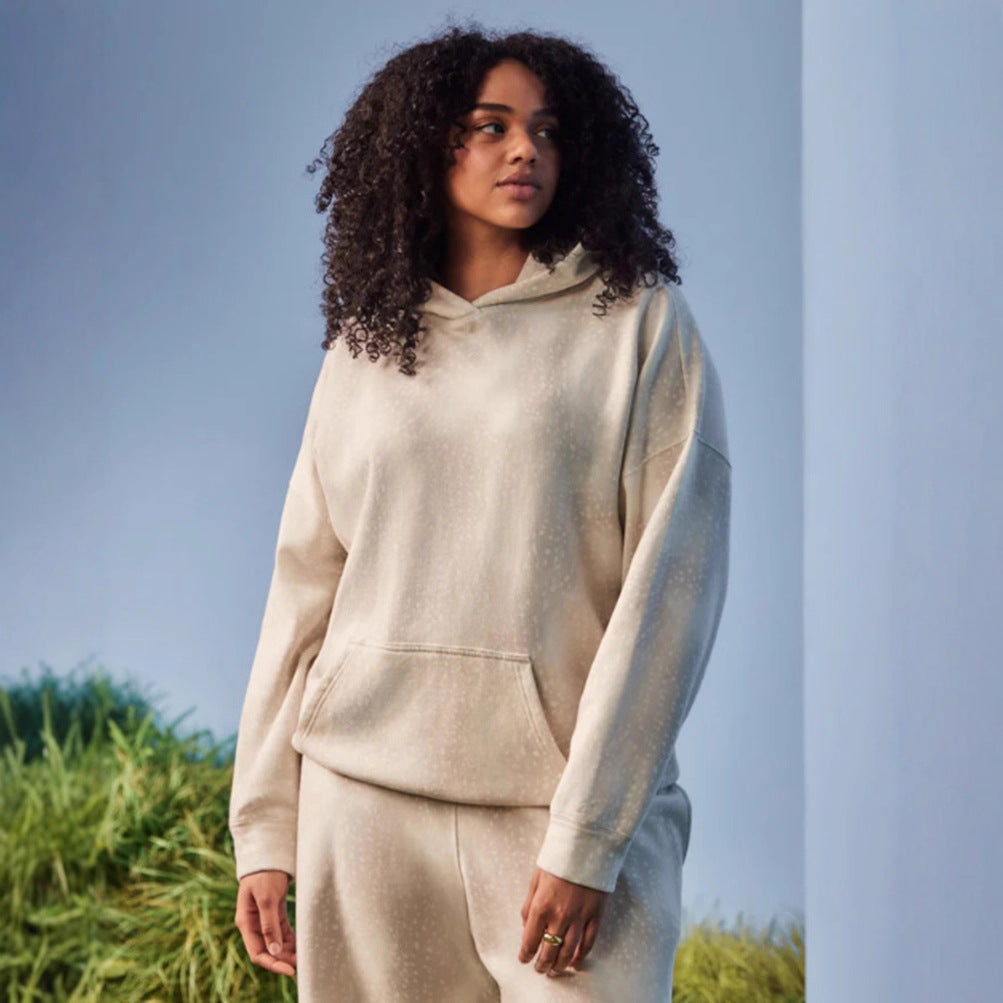 Women's oversized loungewear two-piece set with hooded sweatshirt and wide-cut sweatpants StylebySassy