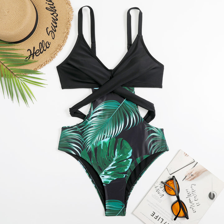Women's one-piece swimsuit with fashionable cut-out and tropical leaf pattern StylebySassy