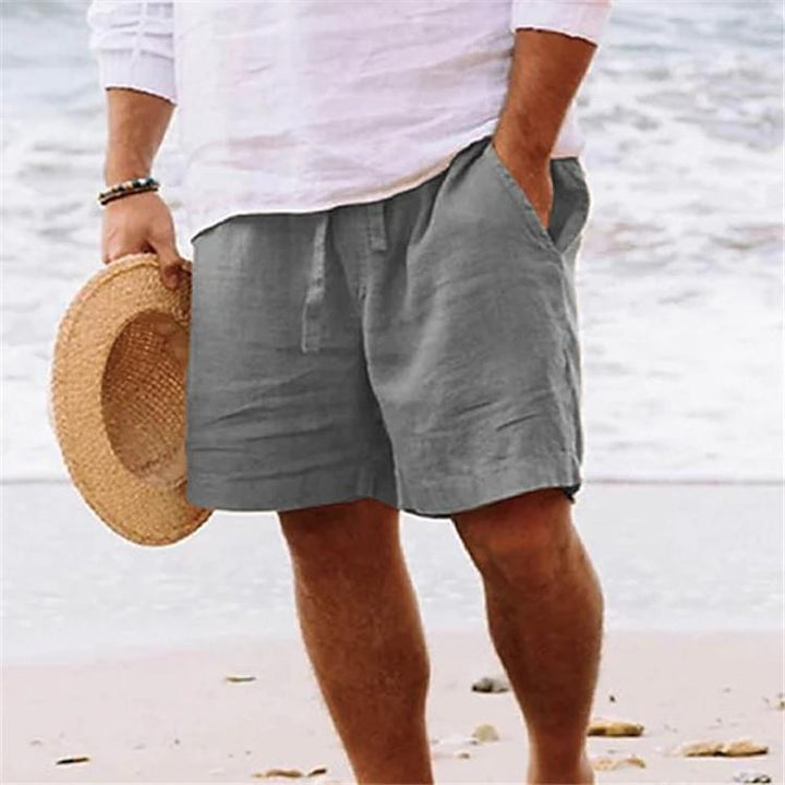 Men's casual travel Bermuda shorts with crinkle texture, adjustable drawstring, and large volume patch pockets StylebySassy
