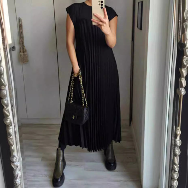 Women's flowing pleated maxi dress with dropped shoulders and side pockets StylebySassy