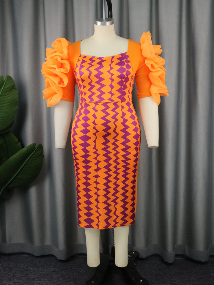 Women's fitted dress with striking ruffle sleeves and geometric pattern StylebySassy