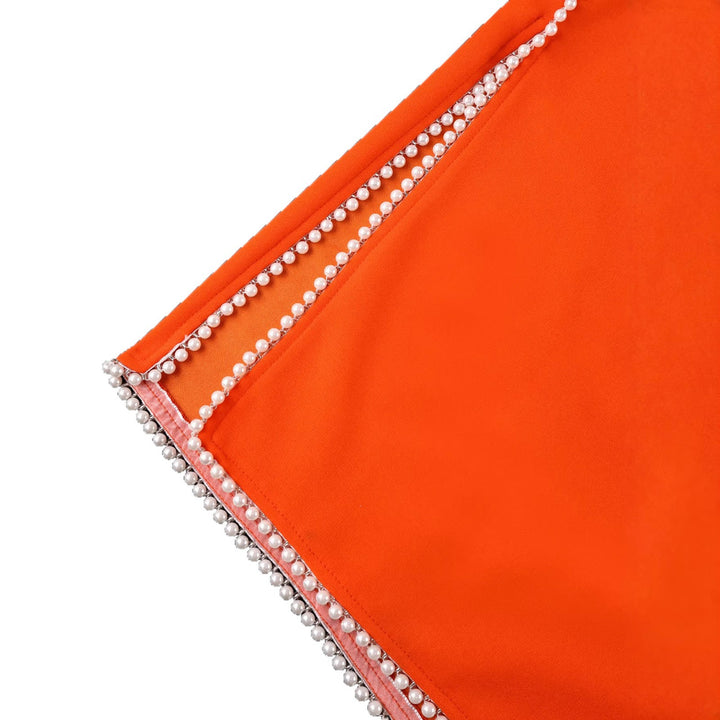 Women's elegant dress with decorative collar and pearl-embellished details StylebySassy