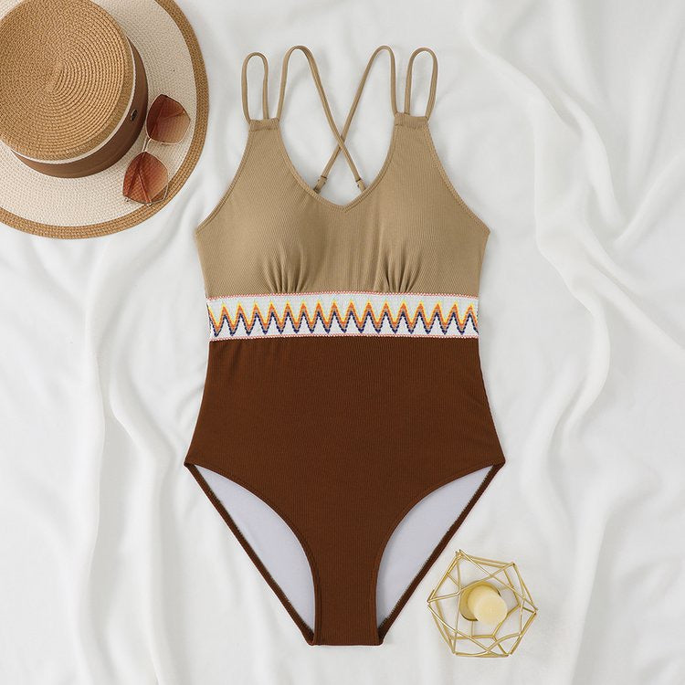 Women's One-Piece Swimsuit with Stylish Back Cutout and Decorative Cuff StylebySassy